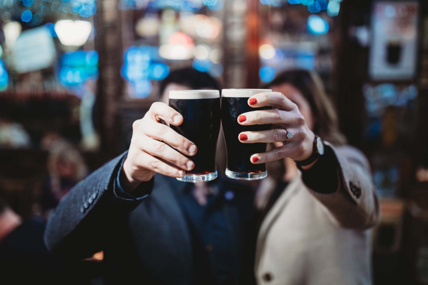Couple drinking pint of guinness at Guinness Storehouse